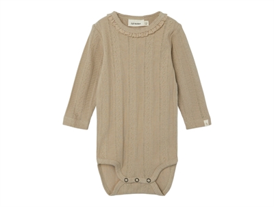Lil Atelier body tuffet ruffle