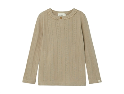 Lil Atelier top tuffet ruffle