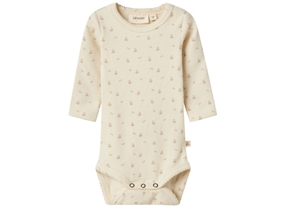 Lil' Atelier body coconut milk with pink floral print
