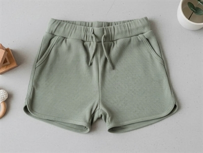 Lil Atelier dried sage swim shorts