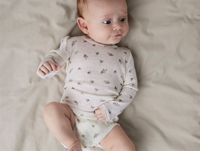 Name It bodysuit snow white with floral print and lace trim in merino wool