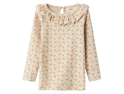 Lil Atelier sheer bliss floral top