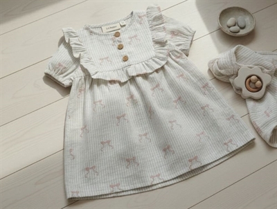Lil Atelier coconut milk bow dress