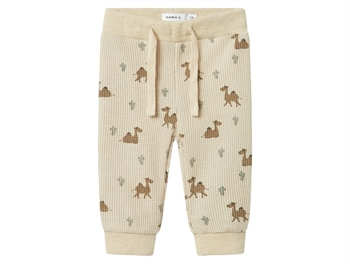 Name It trousers celestial blue with dinosaurs