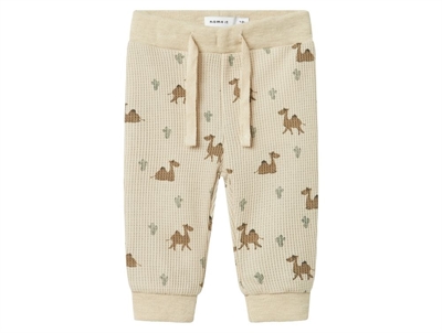 Name It trousers celestial blue with dinosaurs