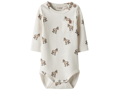 Lil' Atelier body coconut milk with pink floral print