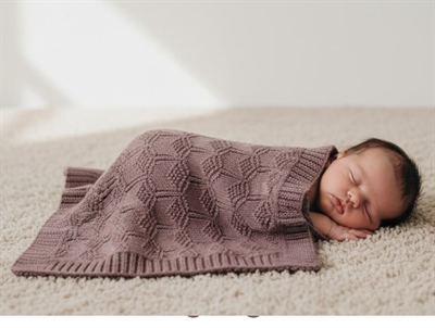 Mushie honeycomb desert rose knitted baby blanket