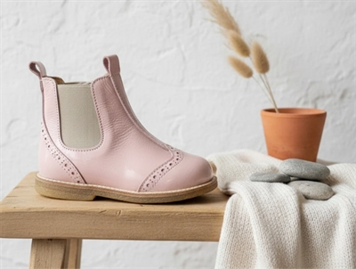 Angulus rosa/beige ancle boot hole pattern