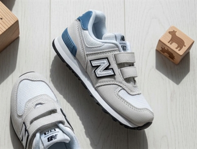 New Balance 574 sneaker reflection with velcro