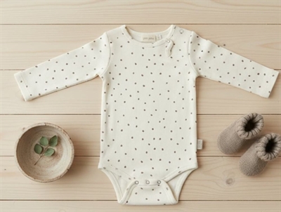 Petit Piao off white dot bodysuit