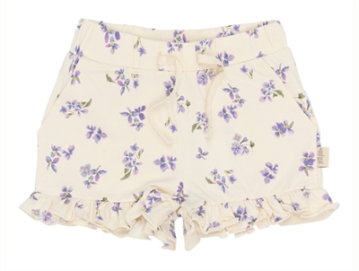 Petit Piao shorts eggnog with floral print and ruffles